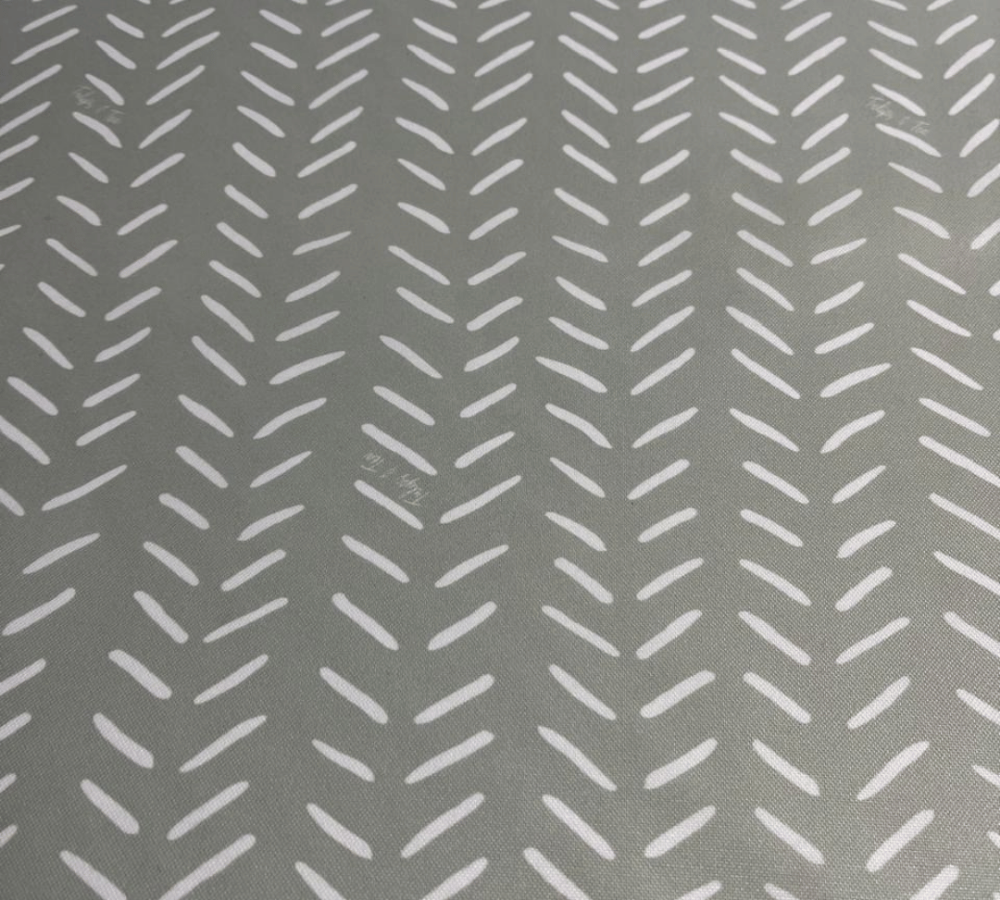 Gray fabric with a white zigzag pattern